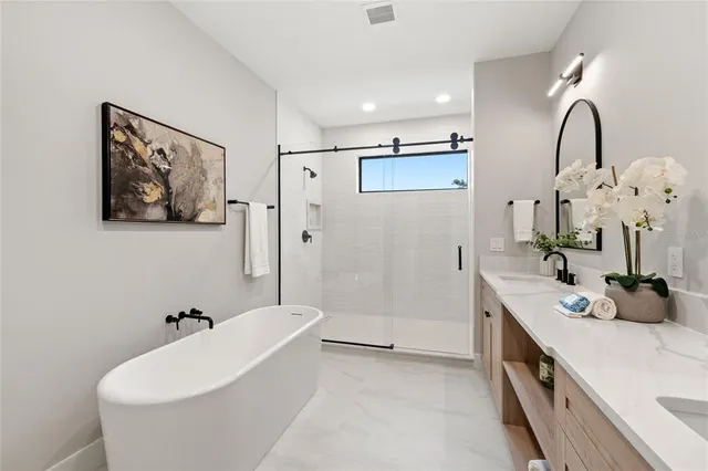 an aerial view of residential building with green space