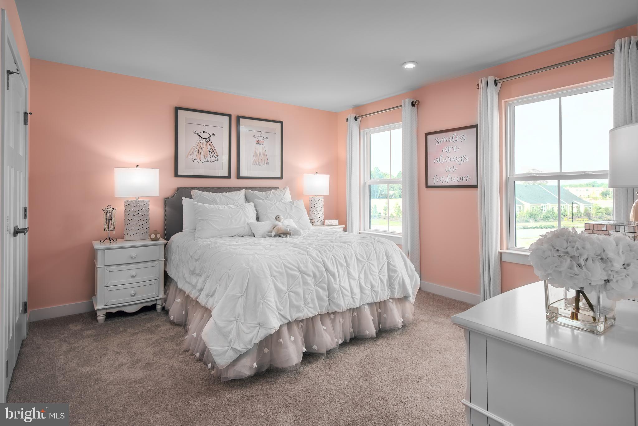 48 Wallace Way Ranson, WV 25438 - Photo 11 of 15 a spacious bedroom with a bed and glass window