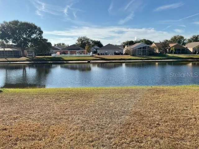 a view of a lake with houses