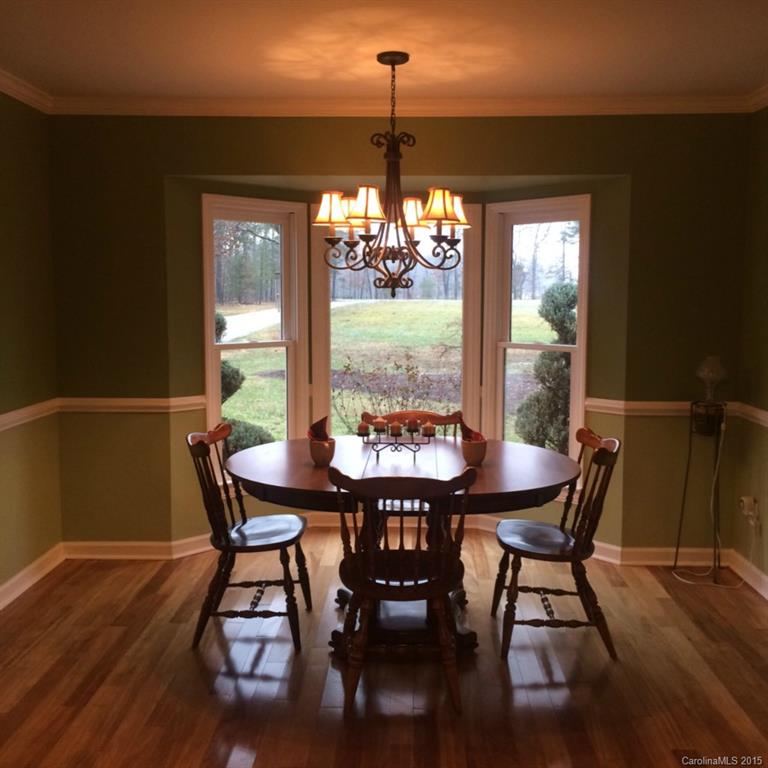 4521 Stack Road Monroe, NC 28112 - Photo 13 of 24 a view of a dining room with furniture and window