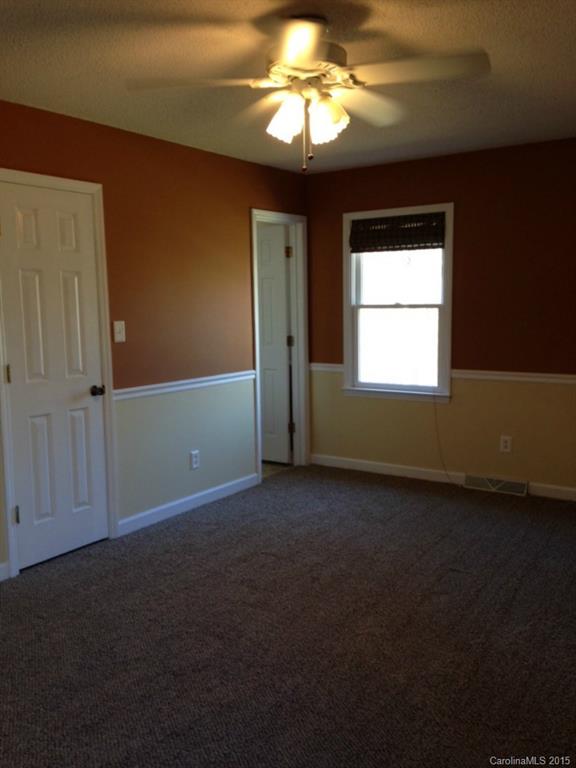 4521 Stack Road Monroe, NC 28112 - Photo 18 of 24 a view of an empty room with a window