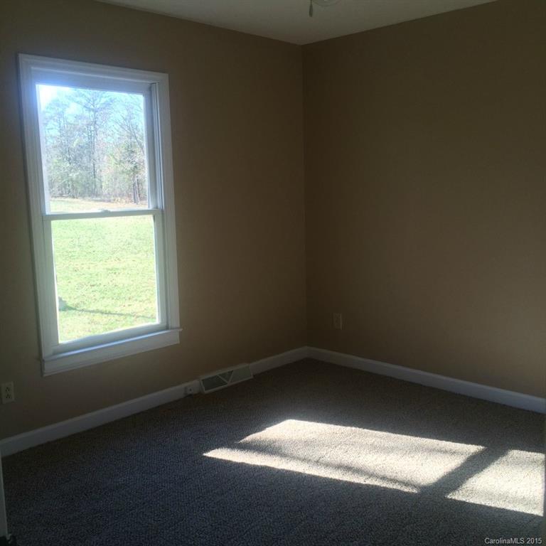 4521 Stack Road Monroe, NC 28112 - Photo 20 of 24 an empty room with a window