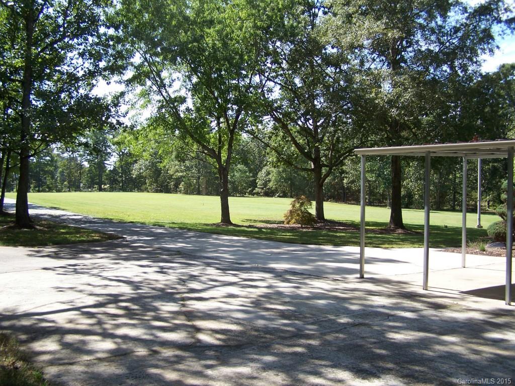 4521 Stack Road Monroe, NC 28112 - Photo 6 of 24 a view of a yard with basketball space
