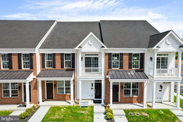 front view of a building with a yard