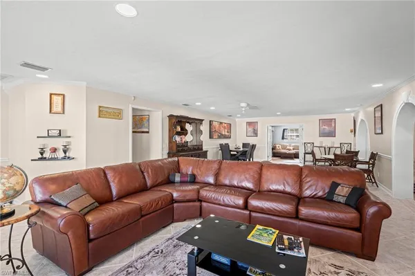 a living room with furniture and a couch