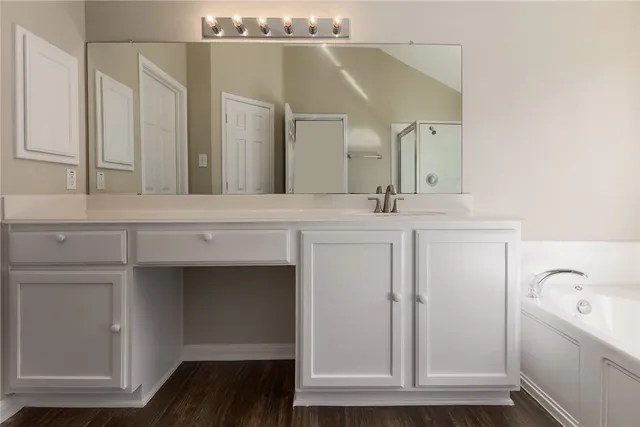 a view of a hallway with washer and dryer