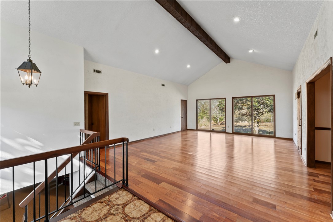 501 Westminster Drive Pendleton, SC 29670 - Photo 4 of 50 The Main Living Room features a soaring vaulted ceiling and large windows offering abundant natural light.
