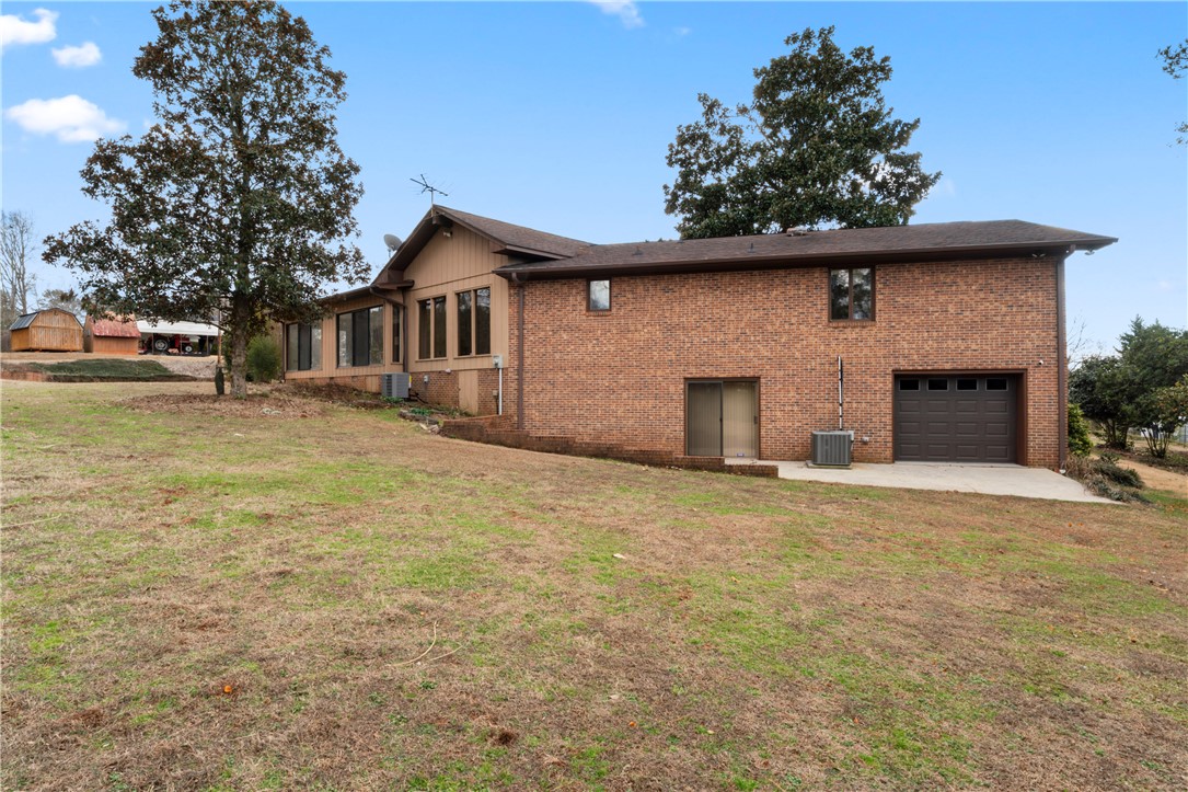 501 Westminster Drive Pendleton, SC 29670 - Photo 47 of 50 This spacious property offers a serene backyard with ample potential for outdoor enjoyment.