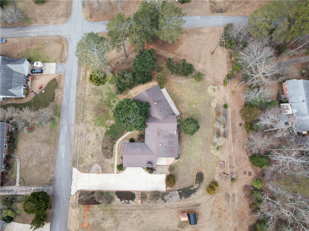 501 Westminster Drive Pendleton, SC 29670 - Photo 50 of 50 An aerial view captures the house nestled among trees and rolling lawn.