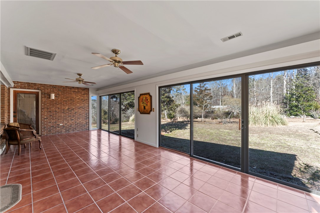 501 Westminster Drive Pendleton, SC 29670 - Photo 9 of 50 Sunroom offers expansive views of the outdoors, perfect for relaxation or entertaining.