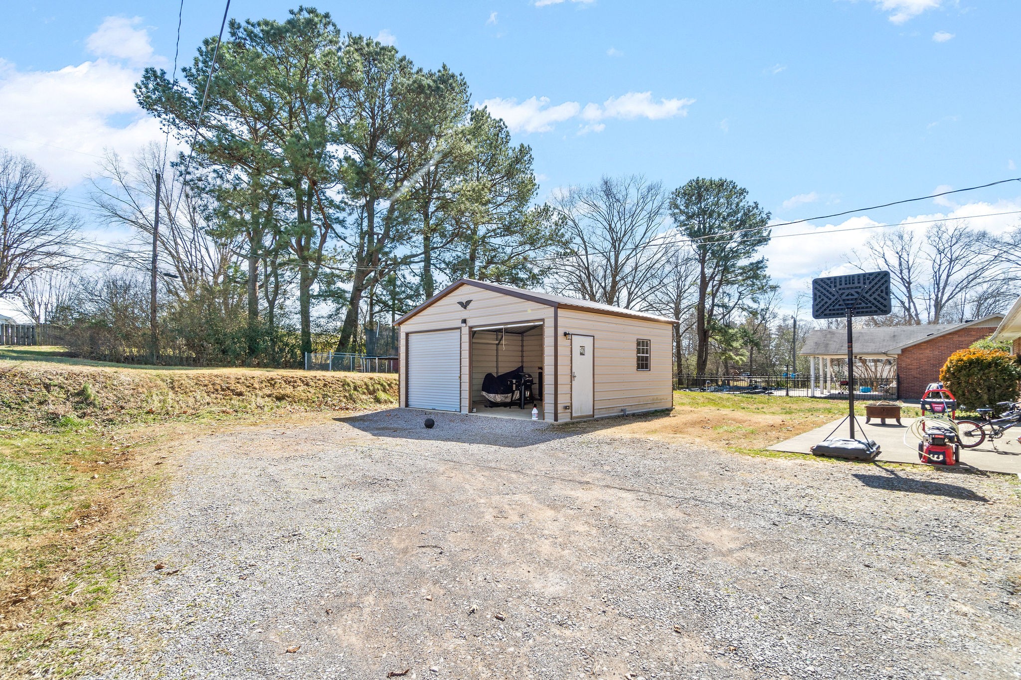 2084 Landon Road Clarksville, TN 37043 - Photo 20 of 24 a view of a house with a yard and large trees
