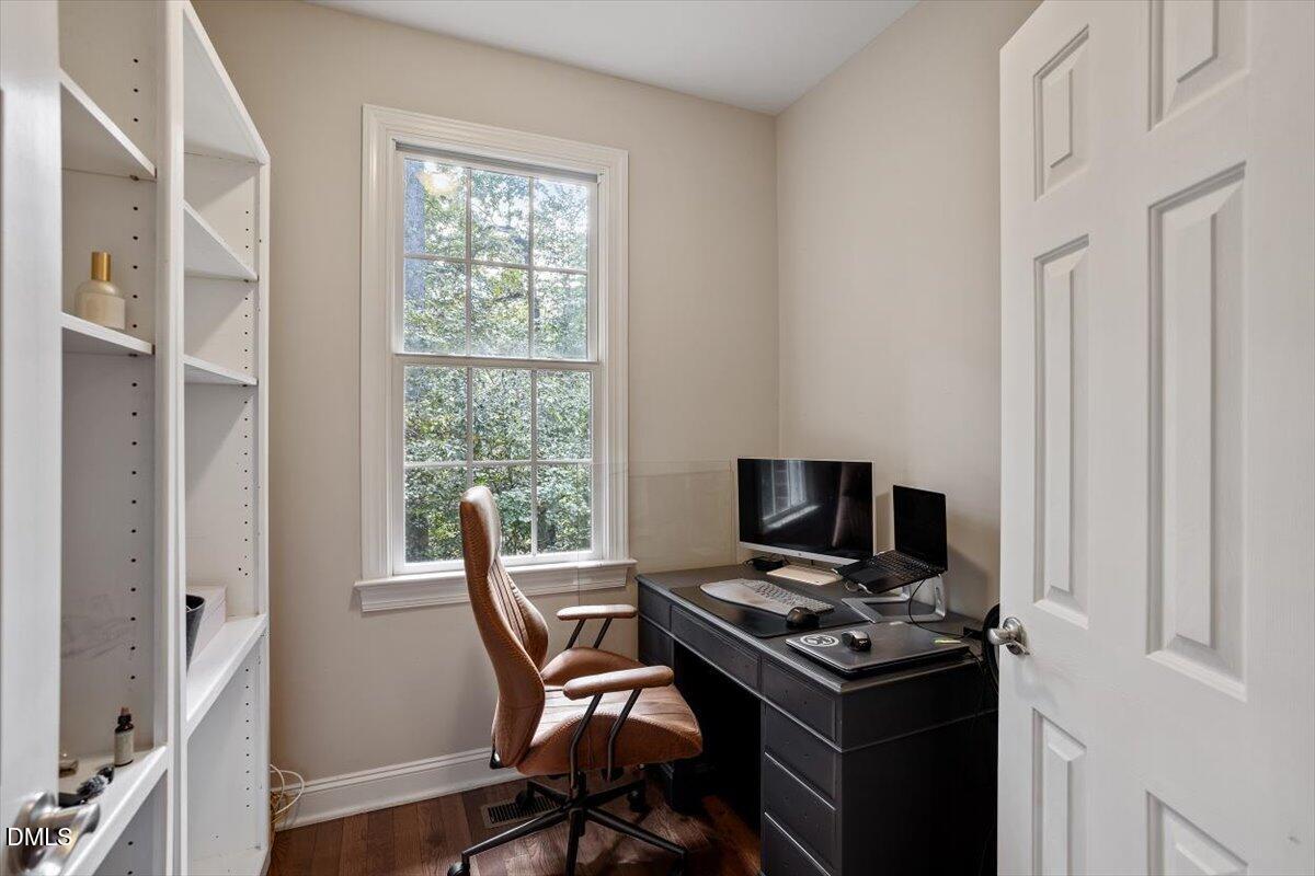 321 Efland - Cedar Grove Road Efland, NC 27243 - Photo 20 of 45 a view of a workspace with furniture and a window