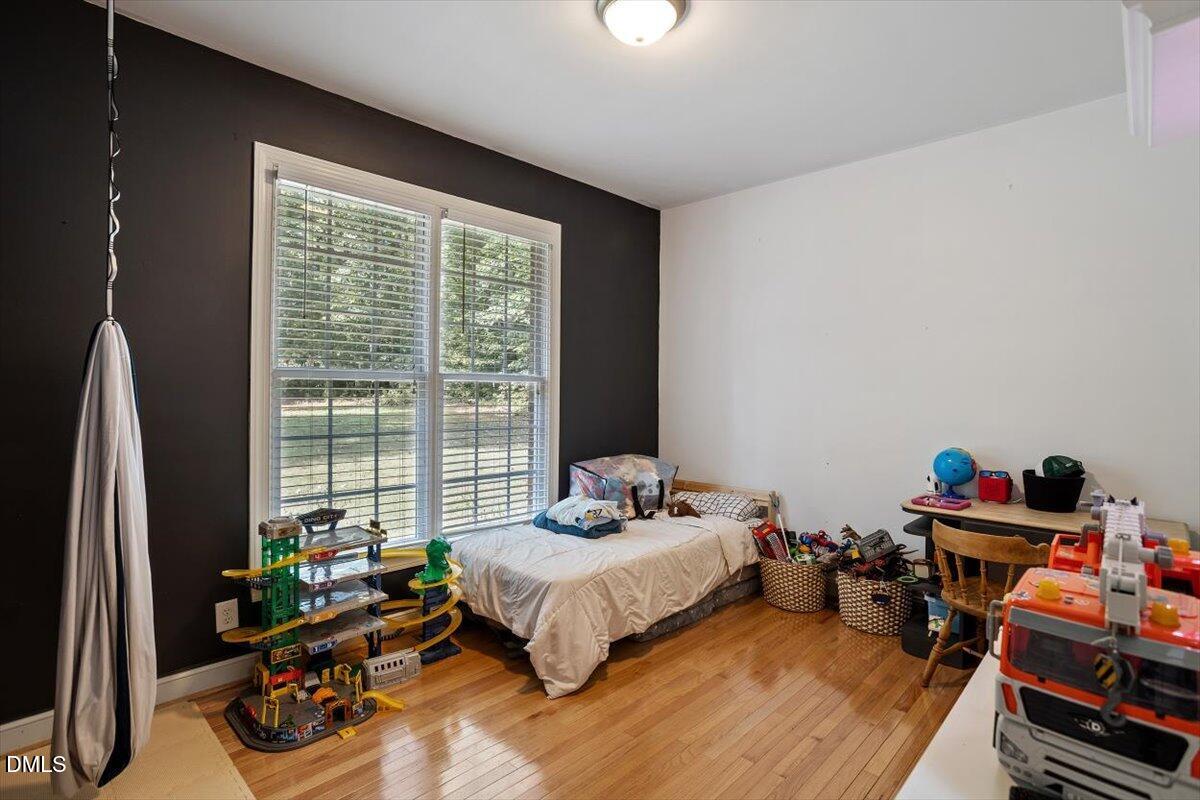 321 Efland - Cedar Grove Road Efland, NC 27243 - Photo 23 of 45 a bedroom with bed and a window