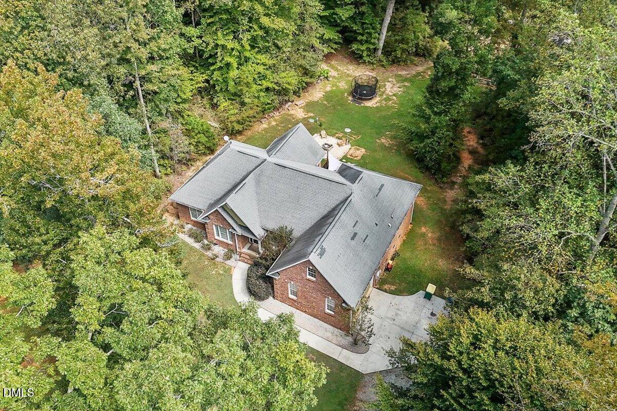 321 Efland - Cedar Grove Road Efland, NC 27243 - Photo 34 of 45 an aerial view of a house with a yard
