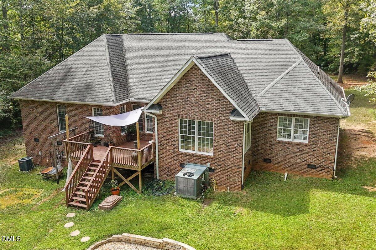 321 Efland - Cedar Grove Road Efland, NC 27243 - Photo 36 of 45 a view of a house with backyard