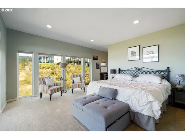 a bedroom with furniture and a couch