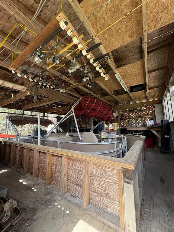 16 Palm Drive Yankeetown, FL 34498 - Photo 11 of 41 a view of a garage with wooden floors