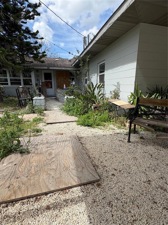 16 Palm Drive Yankeetown, FL 34498 - Photo 22 of 41 a view of a chair and tables in the patio