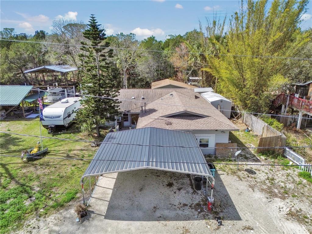 16 Palm Drive Yankeetown, FL 34498 - Photo 40 of 41 an aerial view of a house with garden space and sitting area