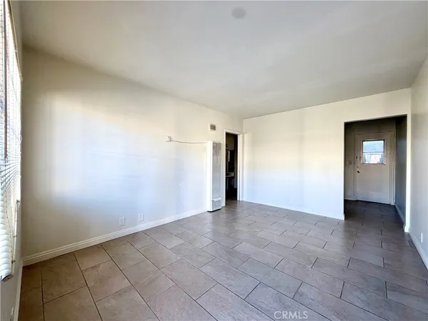 an empty room with a natural light