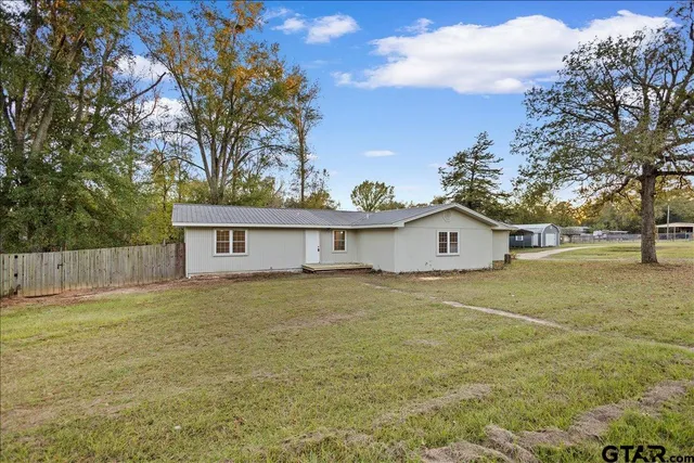 a view of kitchen with wooden floor and window
