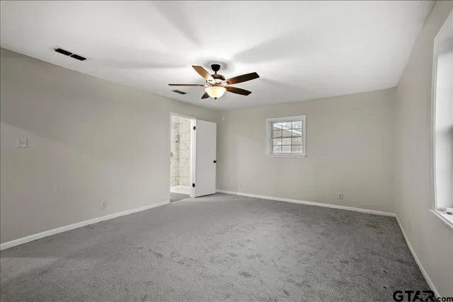 a view of a room with rack on the wall