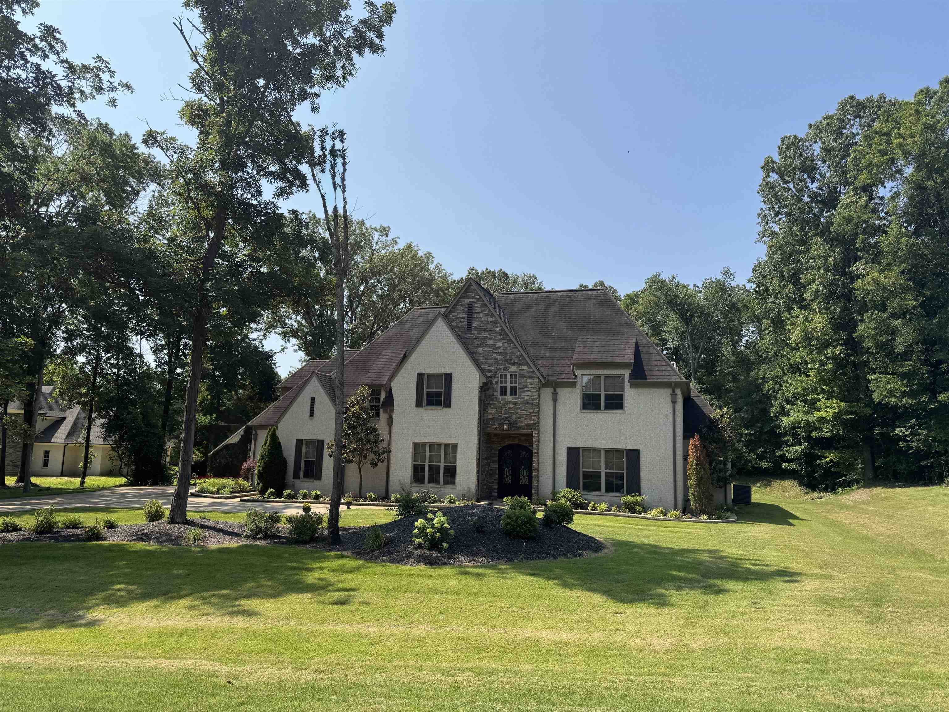 10879 Latting Road Eads, TN 38028 - Photo 1 of 40 Private and secluded 2 acre Home Enjoy the peace and quite and enjoy nature in the Beautiful 5 bedroom 4 1/2 bath home.