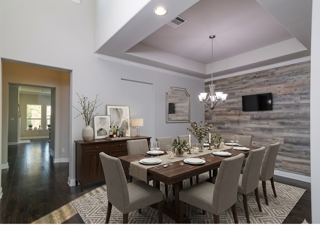 4001 Goodnight Trail Leander, TX 78641 - Photo 5 of 35 a view of a dining room with furniture and wooden floor