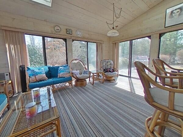 70 Padlock Lane Centerville, MA 02632 - Photo 17 of 23 a living room with furniture and a large window