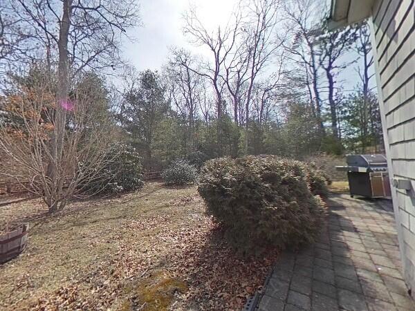 70 Padlock Lane Centerville, MA 02632 - Photo 20 of 23 a view of a pathway with a yard