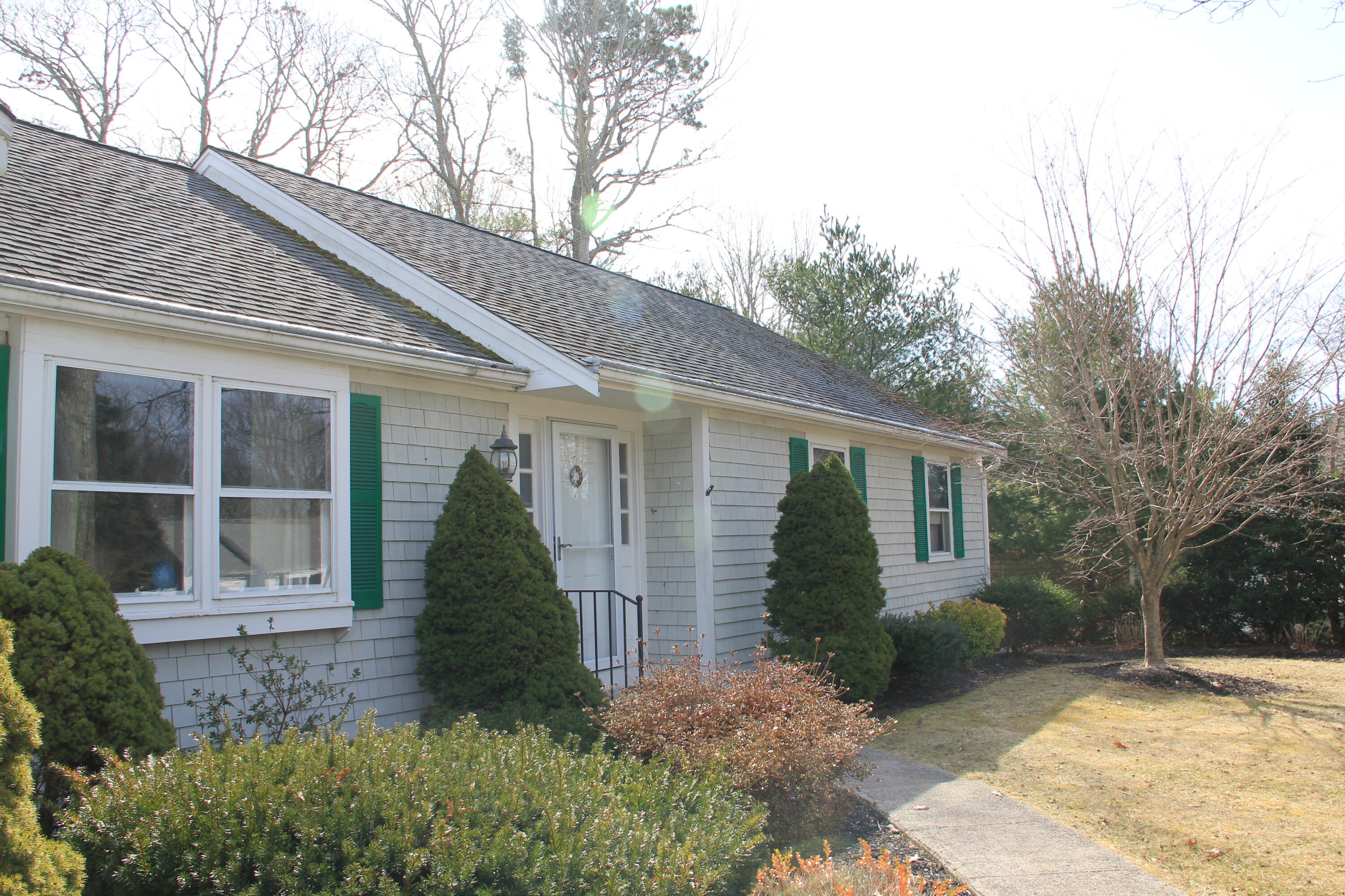 70 Padlock Lane Centerville, MA 02632 - Photo 3 of 23 a view of a house with backyard and garden