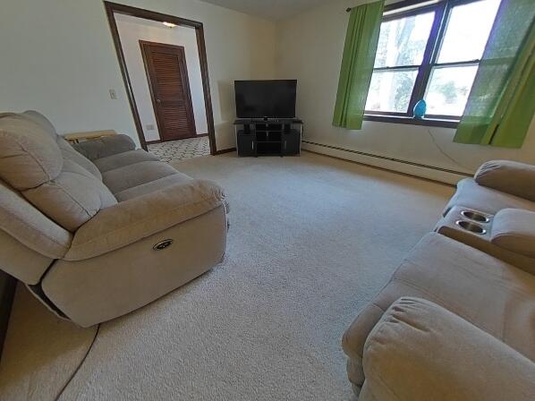 70 Padlock Lane Centerville, MA 02632 - Photo 7 of 23 a living room with furniture and a flat screen tv