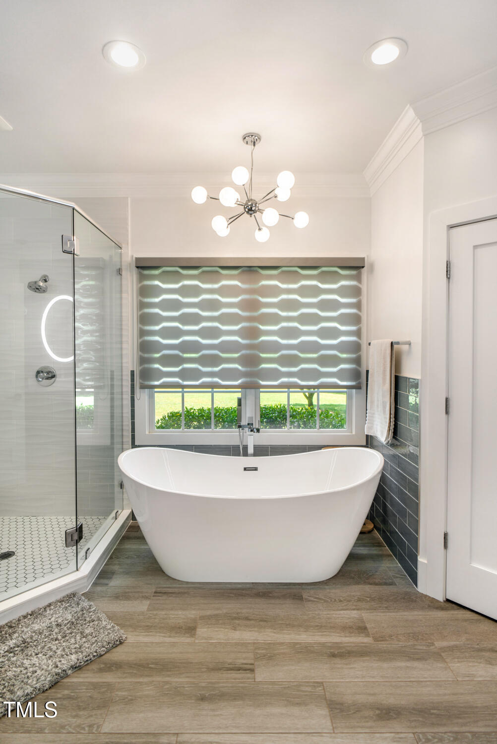412 Bowen Road Rougemont, NC 27572 - Photo 12 of 40 Renovated primary bathroom.soaking tub/custom lighting and blind
