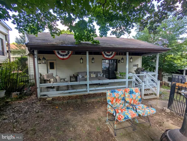 an outdoor space with lots of table and chairs
