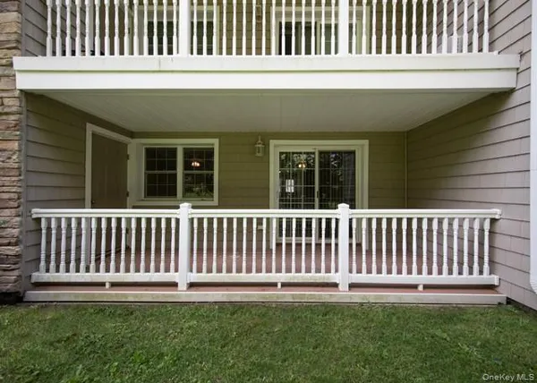a porch with a bench