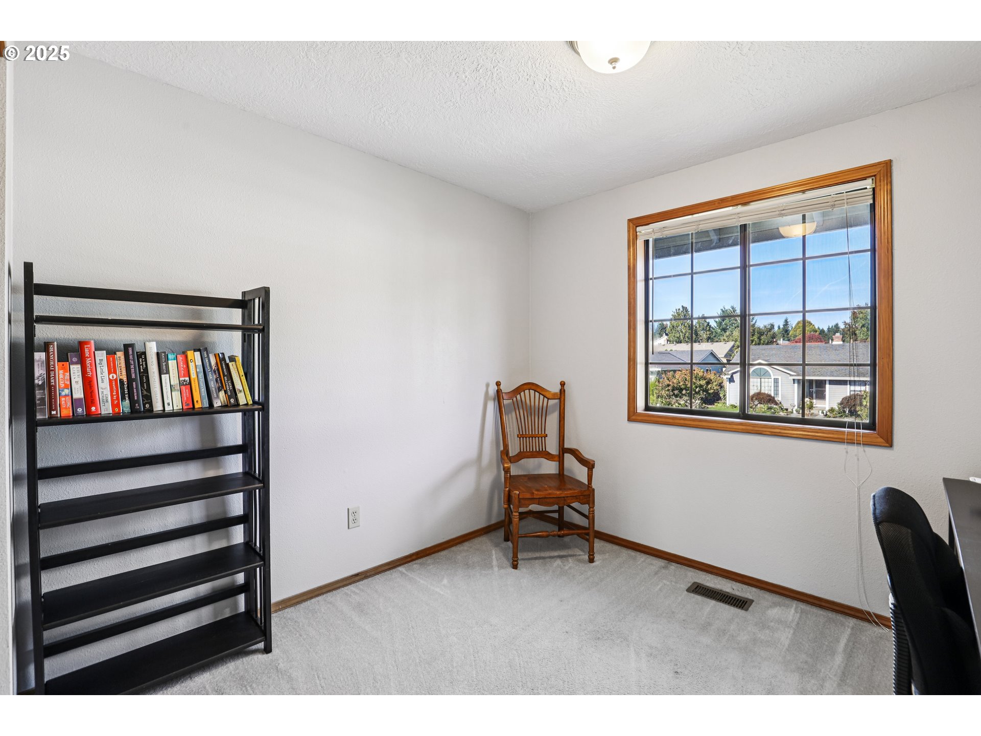 3786 Southwest 8th Street Gresham, OR 97030 - Photo 21 of 43 a living room with furniture and a window