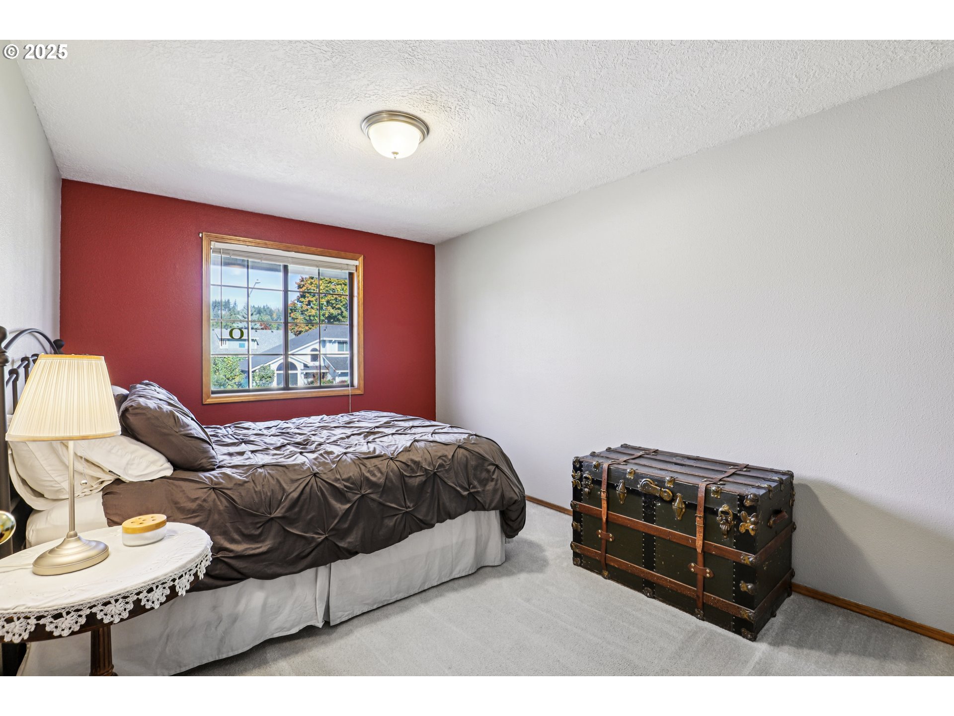 3786 Southwest 8th Street Gresham, OR 97030 - Photo 23 of 43 a bedroom with a bed and a window