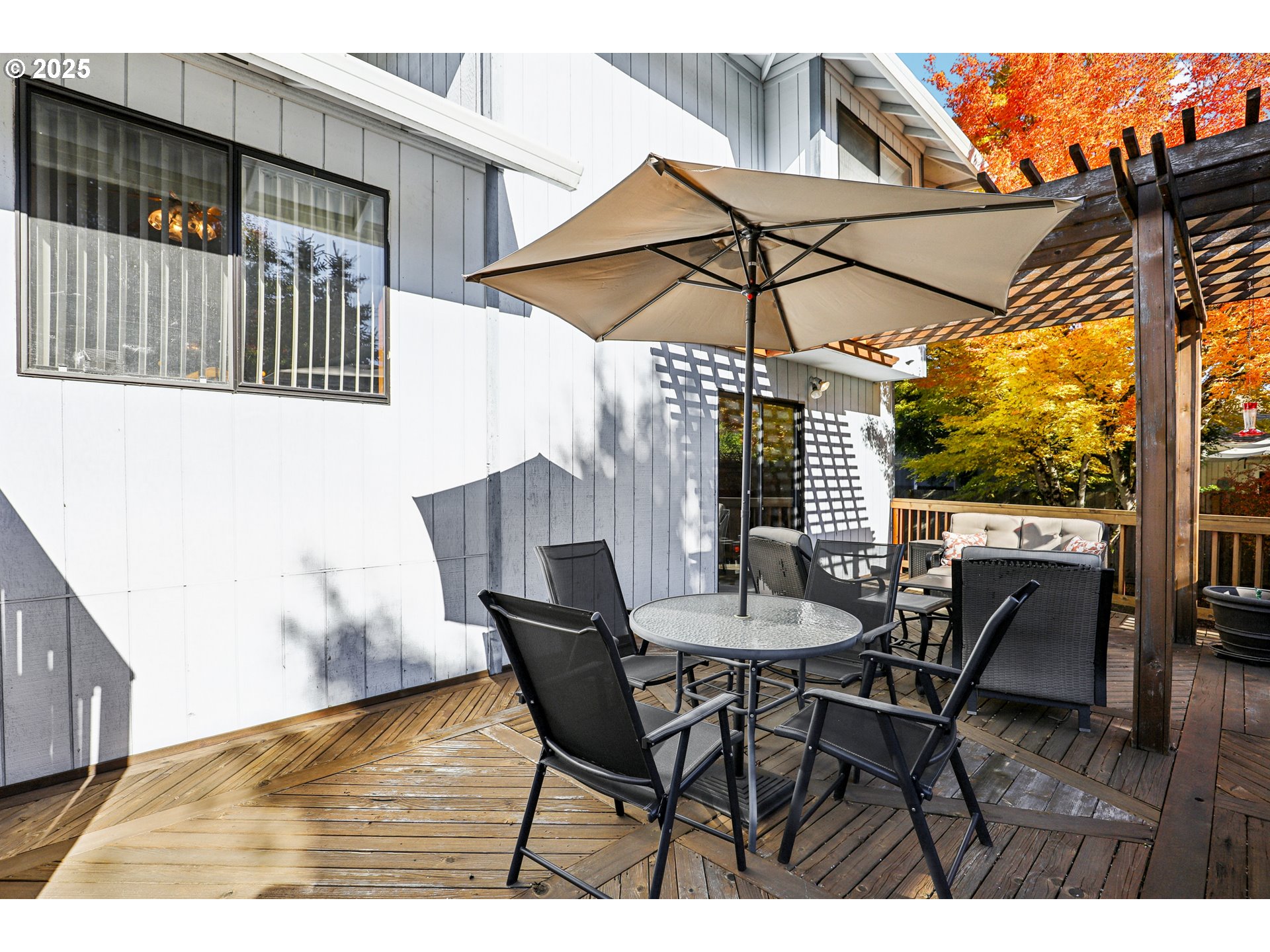 3786 Southwest 8th Street Gresham, OR 97030 - Photo 32 of 43 a patio with table and chairs