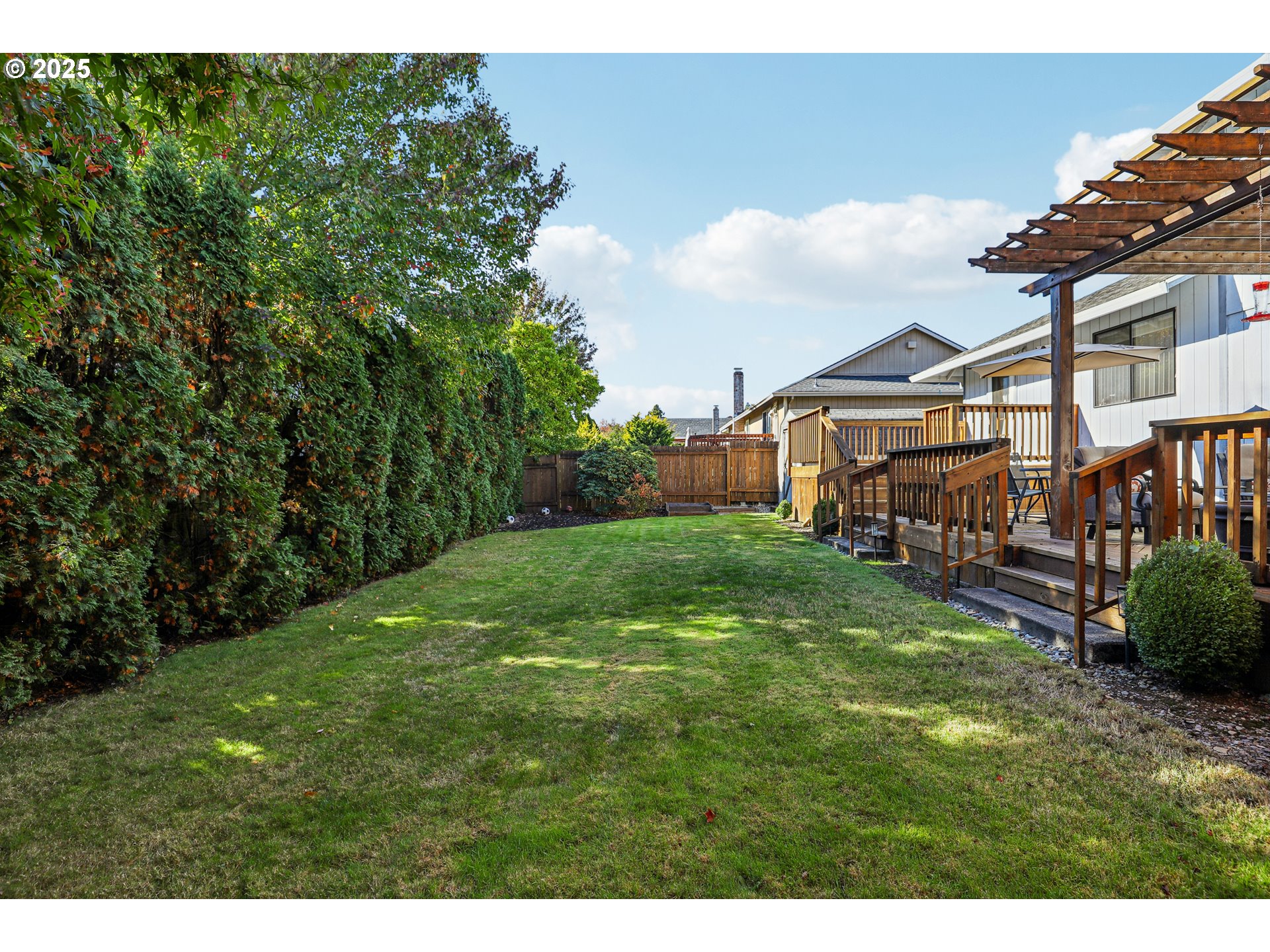 3786 Southwest 8th Street Gresham, OR 97030 - Photo 38 of 43 a view of a house with backyard and porch