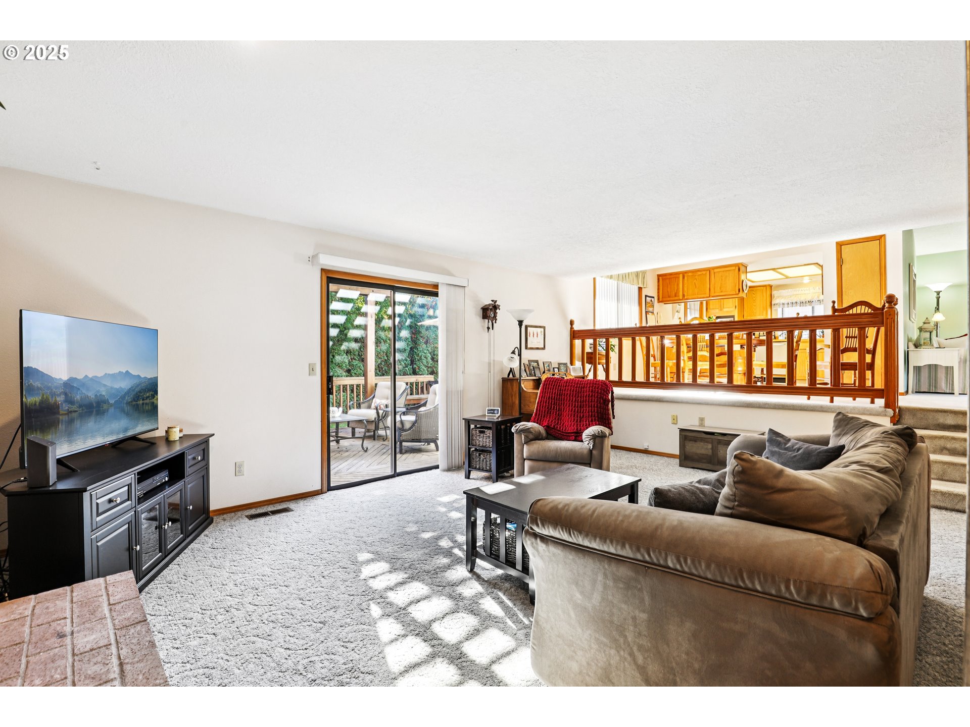 3786 Southwest 8th Street Gresham, OR 97030 - Photo 6 of 43 a living room with furniture and a flat screen tv