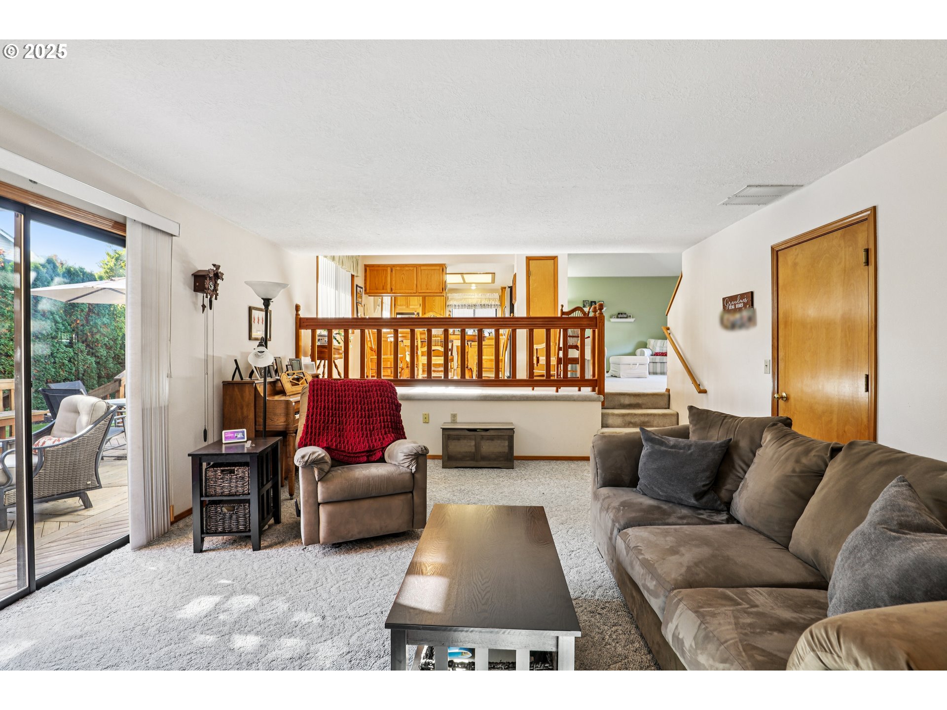 3786 Southwest 8th Street Gresham, OR 97030 - Photo 7 of 43 a living room with furniture ceiling fan and a window