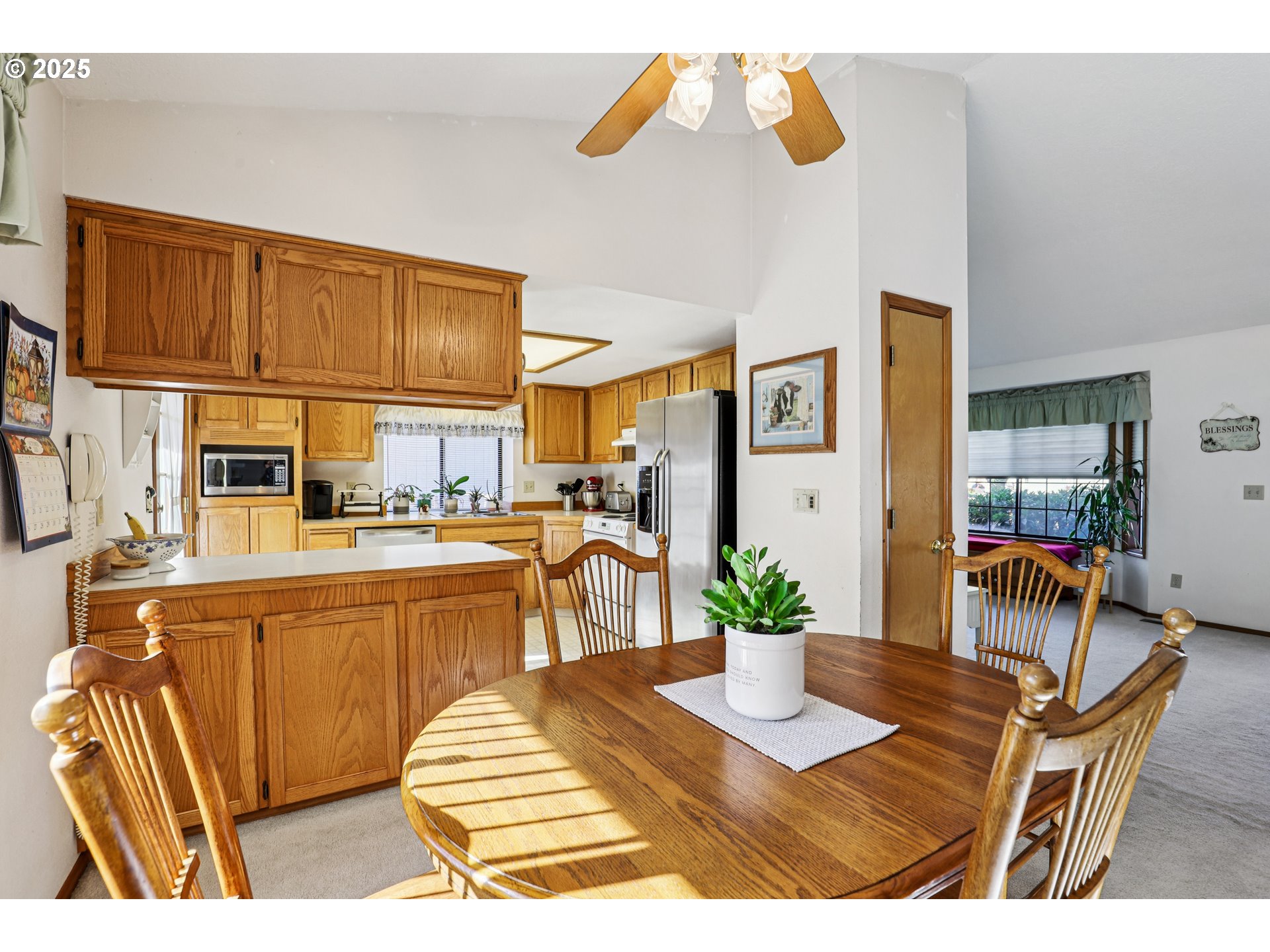 3786 Southwest 8th Street Gresham, OR 97030 - Photo 9 of 43 a dining room filled a table and chairs