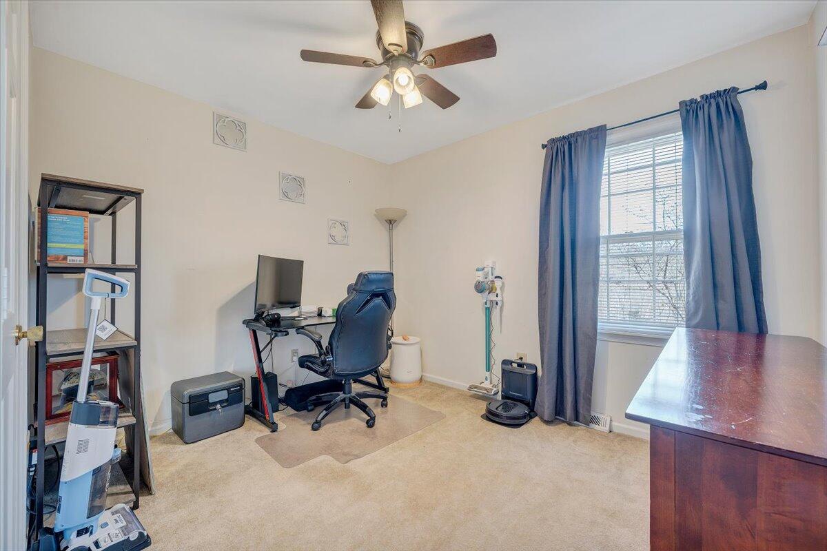 609 Lakeshore Terrace Road Hardy, VA 24101 - Photo 20 of 44 a view of a workspace with furniture and a window