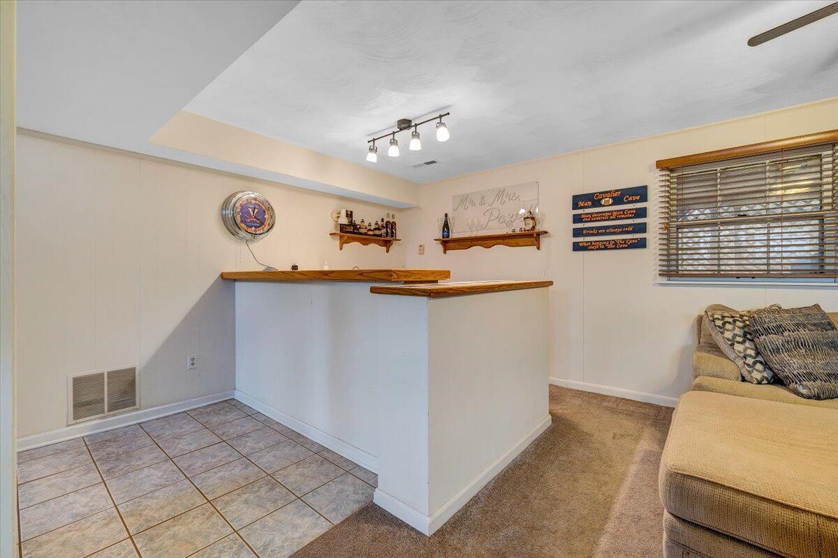 609 Lakeshore Terrace Road Hardy, VA 24101 - Photo 23 of 44 a view of a livingroom with furniture and a ceiling fan