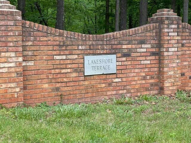 609 Lakeshore Terrace Road Hardy, VA 24101 - Photo 42 of 44 a sign that is on a brick wall