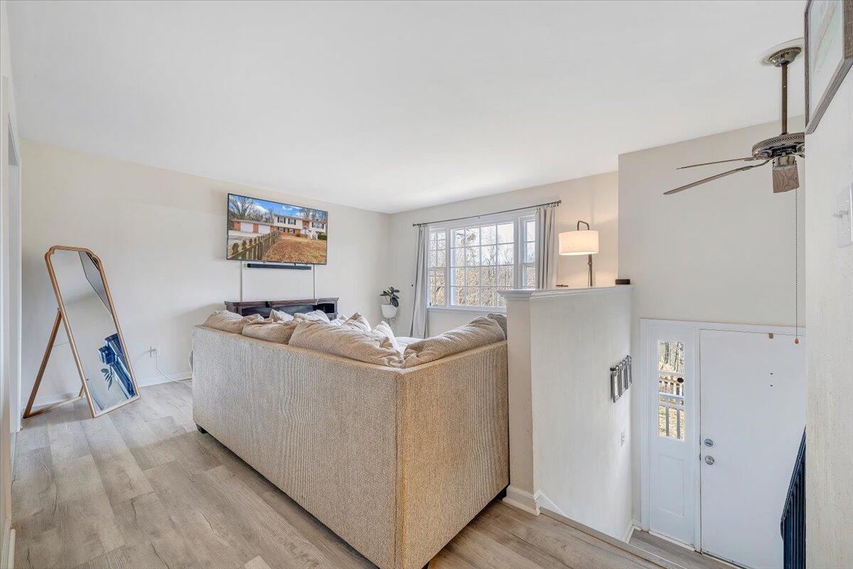 609 Lakeshore Terrace Road Hardy, VA 24101 - Photo 6 of 44 a living room with furniture and a flat screen tv