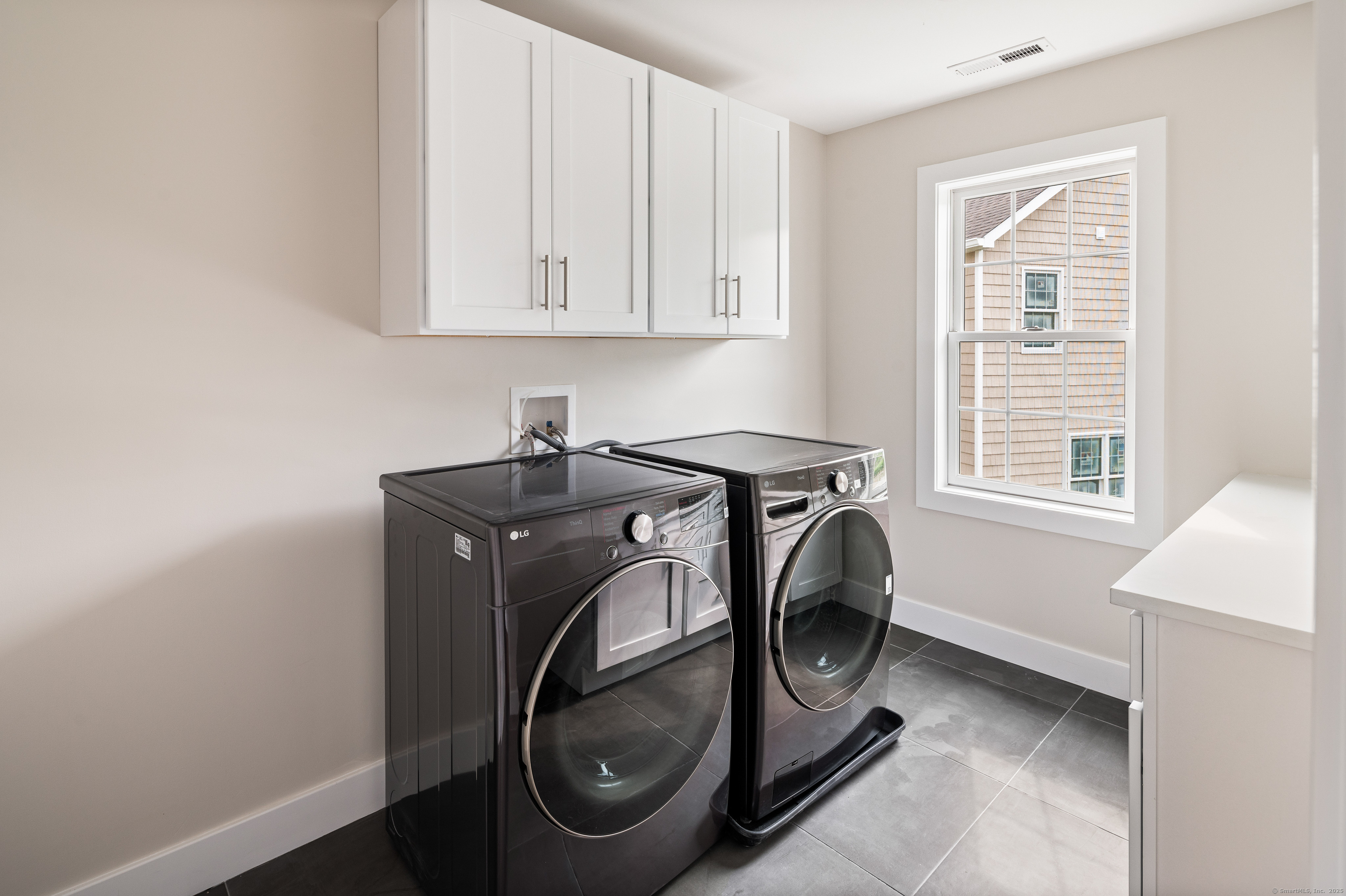 6 Walnut Ridge Court Stamford, CT 06905 - Photo 21 of 35 a utility room with dryer and washer