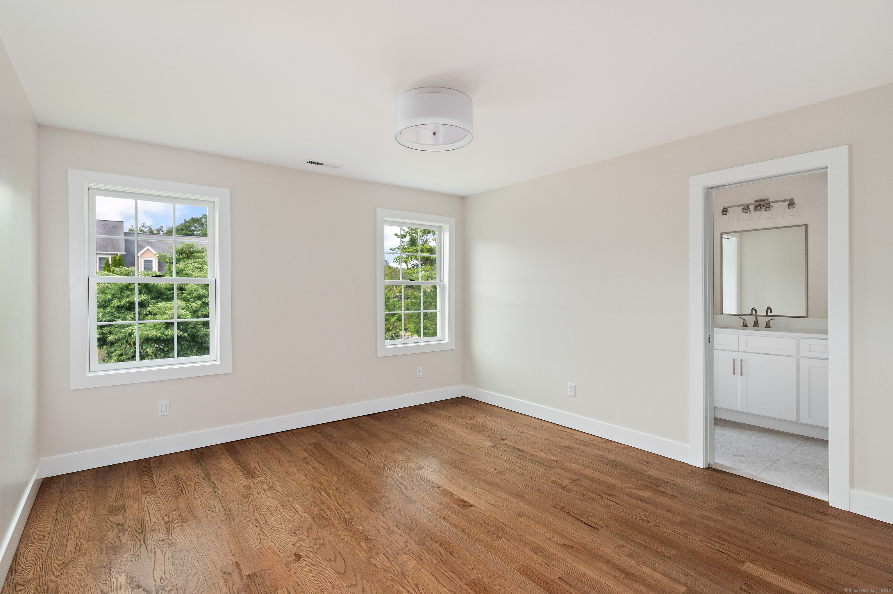 6 Walnut Ridge Court Stamford, CT 06905 - Photo 28 of 35 wooden floor in an empty room with a window