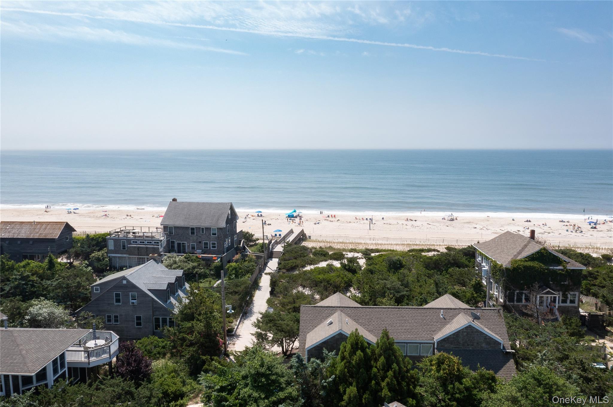 1005 Surf View Ocean Beach, NY 11770 - Photo 2 of 43 an aerial view of multiple house