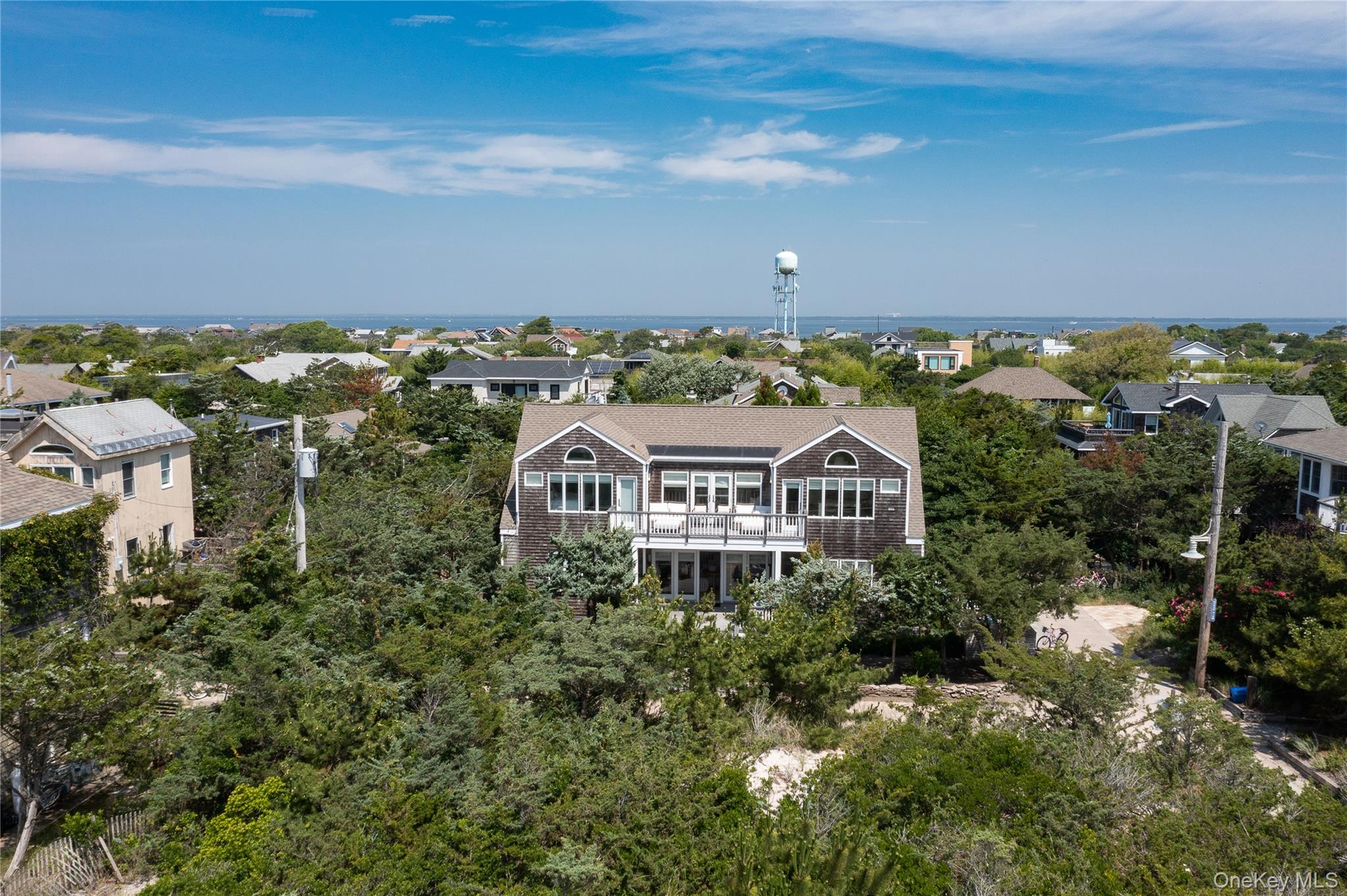 1005 Surf View Ocean Beach, NY 11770 - Photo 39 of 43 an aerial view of a house with a garden